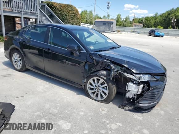 2023 Toyota Camry LE z VIN 4T1C11BK0PU083197, wystawiony jako Copart lot #64838595 z przebiegiem 67 089 mil mil oraz Nie do naprawy • Non repairable. Historia ofert i sprzedaży dostępna na DreamBid. Obrazek 4.