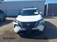 ✅ 2025 Nissan Rogue Platinum • VIN: JN8BT3DD3SW300599 • Lot: 43617459. Listed on IAAI with 8,784 mi. Free auction sales archive from the USA and detailed vehicle history report at DreamBid. Image 12.