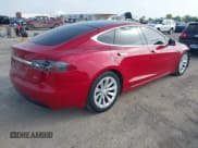 ✅ 2016 Tesla Model S 90D • VIN: 5YJSA1E21GF156369 • Lot: 42741476. Listed on IAAI with 134,088 mi. Free auction sales archive from the USA and detailed vehicle history report at DreamBid. Image 4.