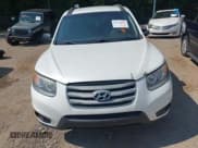 ✅ 2012 Hyundai Santa Fe GLS • VIN: 5XYZGDAG6CG117330 • Lot: 42951822. Listed on IAAI with 124,187 mi. Free auction sales archive from the USA and detailed vehicle history report at DreamBid. Image 6.