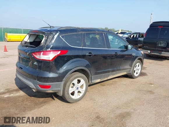 ✅ 2016 Ford Escape SE • VIN: 1FMCU9GX8GUC46611 • Lot: 42901464. Listed on IAAI with 200,058 mi. Free auction sales archive from the USA and detailed vehicle history report at DreamBid. Image 4.