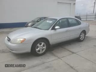 ✅ 2002 Ford Taurus SE Standard • VIN: 1FAFP53U62G209583 • Lot: 70386615. Listed on Copart with 176,460 mi. Free auction sales archive from the USA and detailed vehicle history report at DreamBid. Image 1.