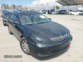 ✅ 2002 Toyota Camry XLE • VIN: JTDBF30K720010344 • Лот: 43095402. Опубликован ранее на IAAI с пробегом 157 528 миль. Бесплатный доступ к архиву аукционных продаж из США и подробный отчёт об истории автомобиля на DreamBid. Изображение 1.