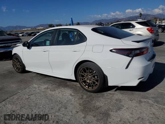 2023 Toyota Camry SE с VIN 4T1T11BK3PU100011, выставлен на аукционе Copart как лот 81764035 с пробегом 24 460 миль миль и Списание • Salvage title. История ставок и продаж доступна на DreamBid. Изображение 2.