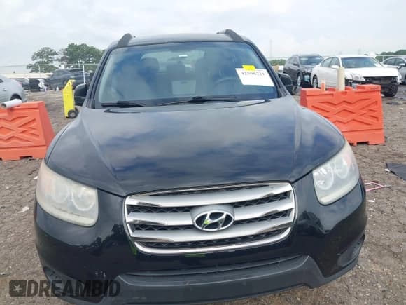 ✅ 2012 Hyundai Santa Fe GLS • VIN: 5XYZGDAG2CG144556 • Lot: 42596221. Listed on IAAI with 164,813 mi. Free auction sales archive from the USA and detailed vehicle history report at DreamBid. Image 12.