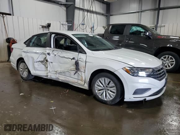 ✅ 2019 Volkswagen Jetta S • VIN: 3VWC57BU7KM013414 • Lot: 57952695. Listed on Copart with 105,177 mi. Free auction sales archive from the USA and detailed vehicle history report at DreamBid. Image 4.