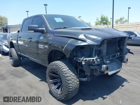 ✅ 2015 Ram 1500 Sport • VIN: 1C6RR7UT1FS684460 • Lot: 42354978. Listed on IAAI with 57,824 mi. Free auction sales archive from the USA and detailed vehicle history report at DreamBid. Image 1.