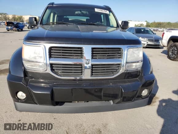2010 Dodge Nitro SE с VIN 1D4PT2GK3AW105206, выставлен на аукционе Copart как лот 77496764 с пробегом 114 603 миль миль и Чистый • Clean title. История ставок и продаж доступна на DreamBid. Изображение 5.