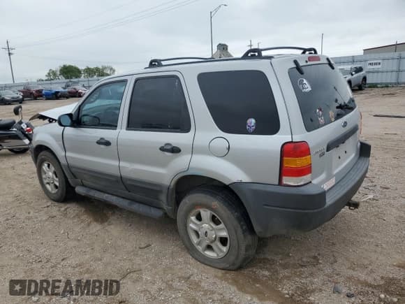 ✅ 2003 Ford Escape XLT Popular • VIN: 1FMCU03103KB75066 • Lot: 64523245. Listed on Copart with 228,232 mi. Free auction sales archive from the USA and detailed vehicle history report at DreamBid. Image 2.