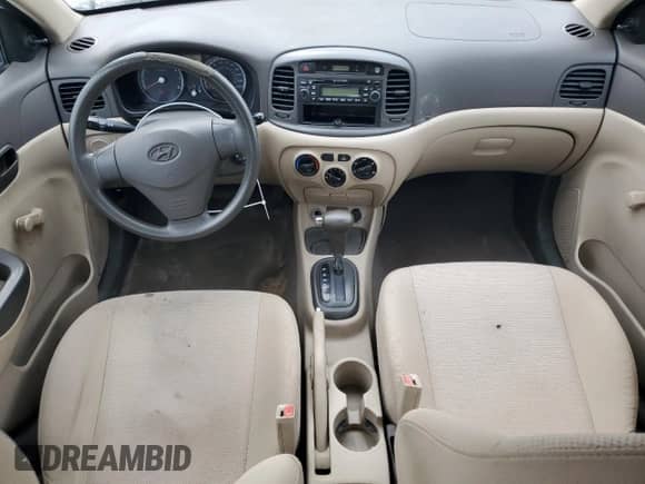 2009 Hyundai Accent L с VIN KMHCN45C99U334487, выставлен на аукционе Copart как лот 86095385 с пробегом 297 758 миль миль и Чистый • Clean title. История ставок и продаж доступна на DreamBid. Изображение 8.