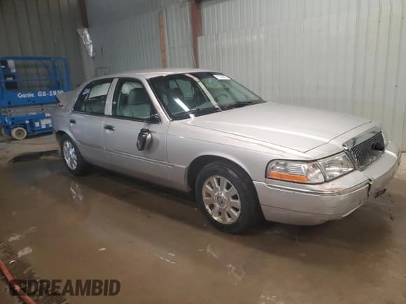 ✅ 2003 Mercury Grand Marquis LS Premium • VIN: 2MEFM75W83X695501 • Lot: 87288885. Listed on Copart with 49,656 mi. Free auction sales archive from the USA and detailed vehicle history report at DreamBid. Image 4.