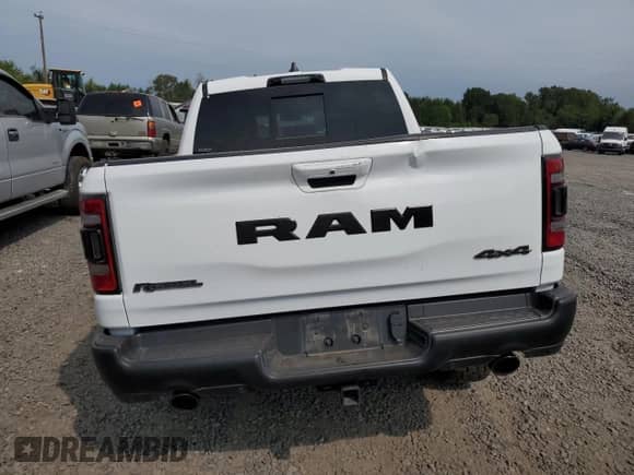 2021 Ram 1500 Rebel z VIN 1C6SRFLT1MN529318, wystawiony jako Copart lot #67312665 z przebiegiem Nie podano mil oraz Szkoda całkowita • Salvage title. Historia ofert i sprzedaży dostępna na DreamBid. Obrazek 6.