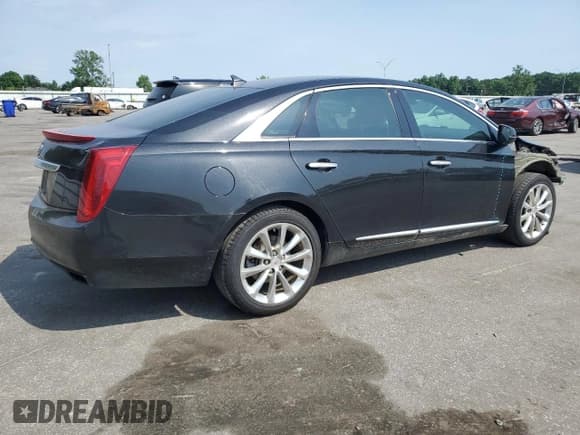 ✅ 2014 Cadillac XTS Luxury • VIN: 2G61M5S38E9132386 • Lot: 57744985. Listed on Copart with 130,940 mi. Free auction sales archive from the USA and detailed vehicle history report at DreamBid. Image 3.