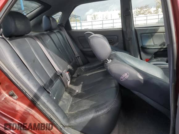 2002 Hyundai Elantra GT z VIN KMHDN55D52U068507, wystawiony jako Copart lot #50656835 z przebiegiem 201 909 mil mil oraz Szkoda całkowita • Salvage title. Historia ofert i sprzedaży dostępna na DreamBid. Obrazek 11.