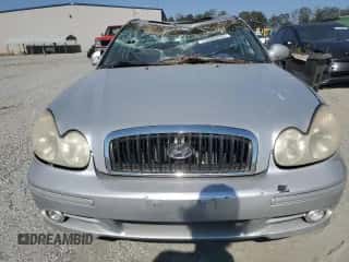 2004 Hyundai Sonata GLS with VIN KMHWF35H04A052801, listed as a Copart auction lot 75386264 with 166,758 mi miles and Salvage title. Bid and sale history available at DreamBid. Image 5.