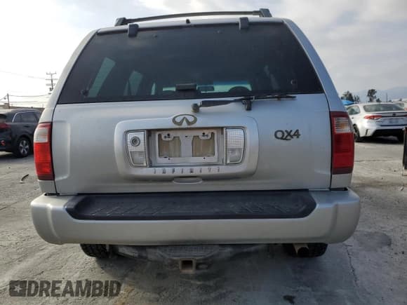 ✅ 2003 Infiniti QX4 Luxury • VIN: JNRDR09Y33W302805 • Lot: 80500135. Wystawiony na Copart z przebiegiem 226 878 mil. Bezpłatny archiwum sprzedaży aukcyjnych z USA i szczegółowy raport historii pojazdu na DreamBid. Zdjęcie 6.