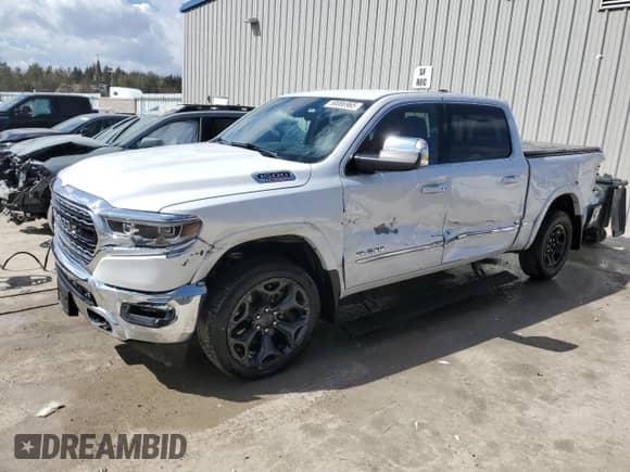 2023 Ram 1500 Limited с VIN 1C6SRFHM5PN503200, выставлен на аукционе Copart как лот 50086965 с пробегом 98 315 миль миль и Списание • Salvage title. История ставок и продаж доступна на DreamBid. Изображение 1.