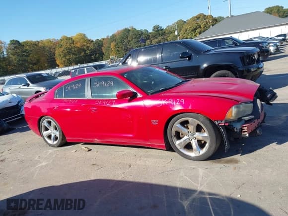 ✅ 2012 Dodge Charger Road/Track • VIN: 2C3CDXCT2CH120466 • Lot: 43623757. Listed on IAAI with 119,806 mi. Free auction sales archive from the USA and detailed vehicle history report at DreamBid. Image 13.