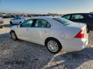 ✅ 2012 Ford Fusion Hybrid • VIN: 3FADP0L38CR275421 • Lot: 82706915. Wystawiony na Copart z przebiegiem 114 585 mil. Bezpłatny archiwum sprzedaży aukcyjnych z USA i szczegółowy raport historii pojazdu na DreamBid. Zdjęcie 2.