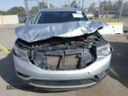 ✅ 2019 GMC Acadia SLE • VIN: 1GKKNSLS1KZ140788 • Lot: 41636885. Listed on IAAI with 175,988 mi. Free auction sales archive from the USA and detailed vehicle history report at DreamBid. Image 13.