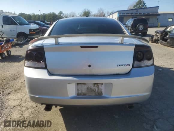 2009 Dodge Charger SRT-8 с VIN 2B3LA73W09H610039, выставлен на аукционе Copart как лот 86885314 с пробегом Не указан миль и Списание • Salvage title. История ставок и продаж доступна на DreamBid. Изображение 6.