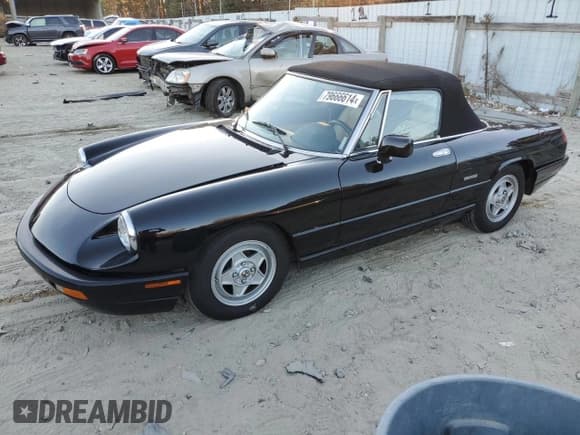 ✅ 1991 Alfa Romeo Spider • VIN: ZARBB32G1M6007546 • Lot: 79666614. Listed on Copart with 72,567 mi. Free auction sales archive from the USA and detailed vehicle history report at DreamBid. Image 1.