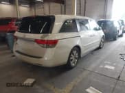 ✅ 2014 Honda Odyssey EX-L • VIN: 5FNRL5H60EB030841 • Lot: 42271401. Listed on IAAI with 107,343 mi. Free auction sales archive from the USA and detailed vehicle history report at DreamBid. Image 4.