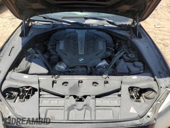 ✅ 2012 BMW 6 Series 650i • VIN: WBALZ3C56CDL70455 • Лот: 65738935. Опубликован ранее на Copart с пробегом 146 171 миль. Бесплатный доступ к архиву аукционных продаж из США и подробный отчёт об истории автомобиля на DreamBid. Изображение 11.