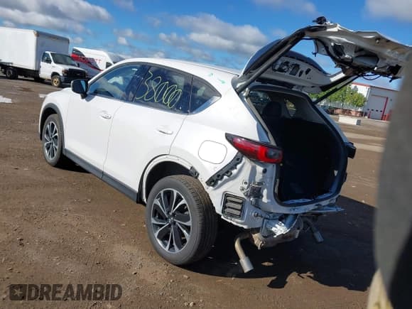✅ 2023 Mazda CX-5 S Premium Plus • VIN: JM3KFBEM7P0119504 • Lot: 42334113. Listed on IAAI with 41,628 mi. Free auction sales archive from the USA and detailed vehicle history report at DreamBid. Image 3.