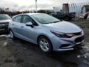 ✅ 2018 Chevrolet Cruze LT • VIN: 3G1BE6SM3JS552320 • Lot: 43445393. Listed on Copart with 61,700 mi. Free auction sales archive from the USA and detailed vehicle history report at DreamBid. Image 4.