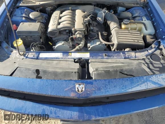 2010 Dodge Challenger SE z VIN 2B3CJ4DV6AH109150, wystawiony jako Copart lot #70212064 z przebiegiem 129 680 mil mil oraz Czysty tytuł • Clean title. Historia ofert i sprzedaży dostępna na DreamBid. Obrazek 13.