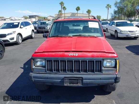 ✅ 1996 Jeep Cherokee Sport • VIN: 1J4FT68S0TL225719 • Lot: 42121351. Listed on IAAI with 237,602 mi. Free auction sales archive from the USA and detailed vehicle history report at DreamBid. Image 6.