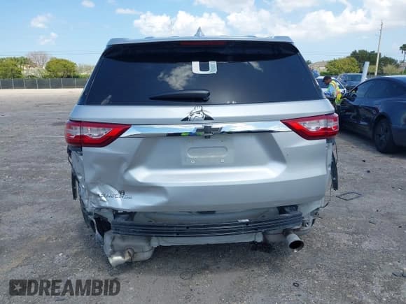 ✅ 2020 Chevrolet Traverse LS • VIN: 1GNERFKW9LJ167575 • Lot: 42026375. Listed on IAAI with 62,454 mi. Free auction sales archive from the USA and detailed vehicle history report at DreamBid. Image 6.