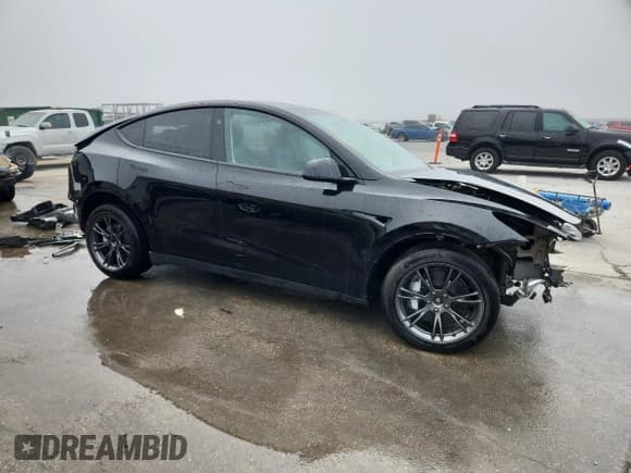 ✅ 2025 Tesla Model Y Long Range • VIN: 7SAYGDEE9SF305918 • Лот: 84817505. Опубликован ранее на Copart с пробегом 2 556 миль. Бесплатный доступ к архиву аукционных продаж из США и подробный отчёт об истории автомобиля на DreamBid. Изображение 4.