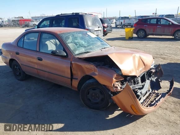 ✅ 1997 Geo Prizm • VIN: 1Y1SK5268VZ443044 • Lot: 41705020. Wystawiony na IAAI z przebiegiem 94 840 mil. Bezpłatny archiwum sprzedaży aukcyjnych z USA i szczegółowy raport historii pojazdu na DreamBid. Zdjęcie 1.