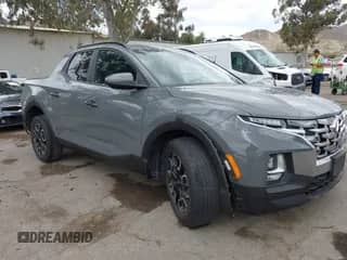 2023 Hyundai Santa Cruz SEL z VIN 5NTJC4AE0PH043393, wystawiony jako IAAI lot #42109647 z przebiegiem 87 730 mil mil oraz . Historia ofert i sprzedaży dostępna na DreamBid. Obrazek 1.