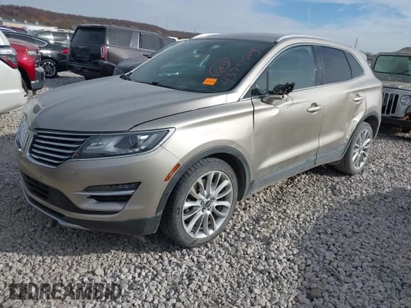 ✅ 2015 Lincoln MKC • VIN: 5LMCJ1A97FUJ46550 • Lot: 43717504. Listed on IAAI with 151,722 mi. Free auction sales archive from the USA and detailed vehicle history report at DreamBid. Image 2.