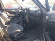 ✅ 2014 MINI Countryman S • VIN: WMWZC5C56EWP36719 • Lot: 42796859. Listed on IAAI with 133,003 mi. Free auction sales archive from the USA and detailed vehicle history report at DreamBid. Image 5.