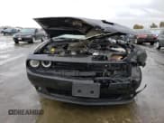 ✅ 2022 Dodge Challenger SXT • VIN: 2C3CDZAG8NH182166 • Lot: 37033443. Wystawiony na Copart z przebiegiem 5 301 mil. Bezpłatny archiwum sprzedaży aukcyjnych z USA i szczegółowy raport historii pojazdu na DreamBid. Zdjęcie 5.