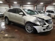 ✅ 2014 Cadillac SRX Performance Collection • VIN: 3GYFNFE37ES559315 • Lot: 89825135. Listed on Copart with 185,563 mi. Free auction sales archive from the USA and detailed vehicle history report at DreamBid. Image 4.