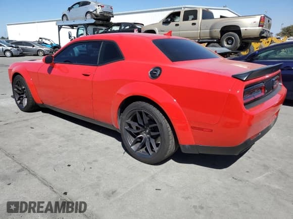 ✅ 2022 Dodge Challenger R/T Scat Pack Widebody • VIN: 2C3CDZFJ3NH109033 • Lot: 70006854. Wystawiony na Copart z przebiegiem 38 605 mil. Bezpłatny archiwum sprzedaży aukcyjnych z USA i szczegółowy raport historii pojazdu na DreamBid. Zdjęcie 2.