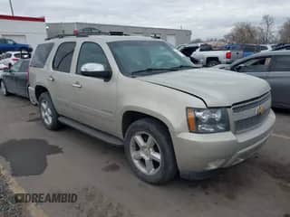 2013 Chevrolet Tahoe LTZ with VIN 1GNSCCE03DR127957, listed as a IAAI auction lot 41499268 with 64,292 mi miles and . Bid and sale history available at DreamBid. Image 1.