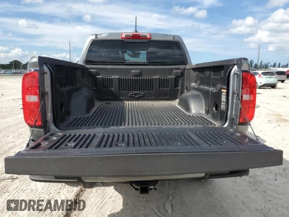 ✅ 2019 Chevrolet Colorado 2WD LT • VIN: 1GCGSCENXK1306568 • Лот: 71626554. Опубликован ранее на Copart с пробегом 68 043 миль. Бесплатный доступ к архиву аукционных продаж из США и подробный отчёт об истории автомобиля на DreamBid. Изображение 6.