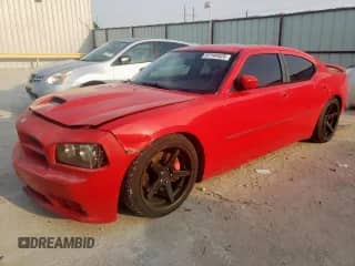 2007 Dodge Charger SRT-8 с VIN 2B3LA73W37H669857, выставлен на аукционе Copart как лот 57144425 с пробегом 169 933 миль миль и Чистый • Clean title. История ставок и продаж доступна на DreamBid. Изображение 1.