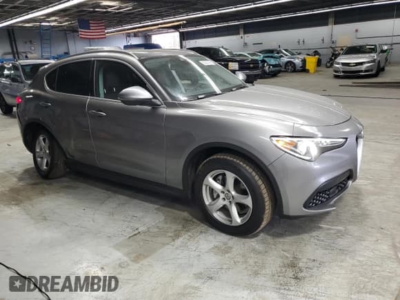 ✅ 2018 Alfa Romeo Stelvio • VIN: ZASFAKAN7J7C01195 • Lot: 82287485. Listed on Copart with 62,431 mi. Free auction sales archive from the USA and detailed vehicle history report at DreamBid. Image 4.