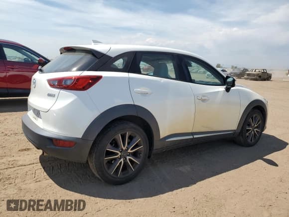 ✅ 2018 Mazda CX-3 Grand Touring • VIN: JM1DKDD74J0320532 • Lot: 68226595. Listed on Copart with 56,761 mi. Free auction sales archive from the USA and detailed vehicle history report at DreamBid. Image 3.