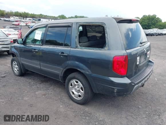 2003 Honda Pilot LX with VIN 2HKYF18173H544653, listed as a IAAI auction lot 42687162 with 258,132 mi miles and . Bid and sale history available at DreamBid. Image 3.
