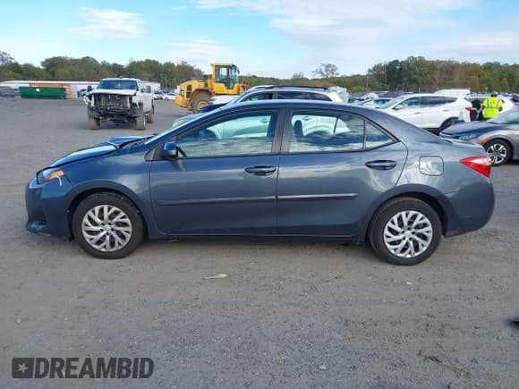 ✅ 2018 Toyota Corolla LE • VIN: 2T1BURHE5JC019684 • Lot: 43434106. Listed on IAAI with 104,991 mi. Free auction sales archive from the USA and detailed vehicle history report at DreamBid. Image 14.
