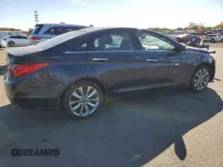 ✅ 2012 Hyundai Sonata Limited • VIN: 5NPEC4AB5CH406674 • Lot: 75933354. Listed on Copart with 118,078 mi. Free auction sales archive from the USA and detailed vehicle history report at DreamBid. Image 3.