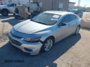 ✅ 2018 Chevrolet Malibu LT • VIN: 1G1ZD5ST0JF143540 • Lot: 43624964. Listed on IAAI with 142,288 mi. Free auction sales archive from the USA and detailed vehicle history report at DreamBid. Image 2.